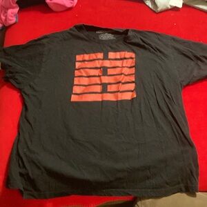 Gijoe black with red decal on it short sleeve t shirt